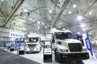 exhibition stand design - IVECO. How to use powerful audio visuals to increase foot traffic at your next trade show.